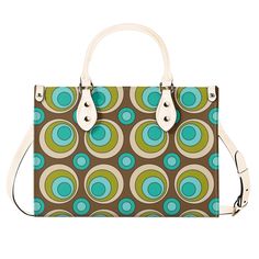 This funky satchel is a blast from the past, with a mid century modern design featuring groovy orbs. With its retro style, it's sure to make a statement while also offering practicality. Carry all your essentials in one stylish bag. Get ready to turn heads and embrace your inner hippie! Premium PU Leather: Crafted from high-quality PU leather for durability and style. Versatile Sizing: Available in three sizes to suit your needs and preferences. Sturdy Top Handles: Features two sturdy top handle Retro Green Shopping Bag, Vintage Green Satchel For Shopping, Retro Green Tote Shoulder Bag, Retro Green Satchel In Tote Shape, Retro Brown Satchel, Retro Green Satchel Shoulder Bag, Green Retro Shoulder Bag For Shopping, Retro Brown Shoulder Bag For On-the-go, Retro Multicolor Satchel For Shopping