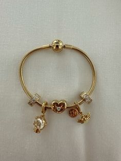 #pandora #pandorastyle #goldjewelryideas Pandora Jewelry Gold, Pandora Gold Bracelet Ideas, Good Pandora Bracelet, Gold Bracelet Pandora, Gold Jewelry Combo, Pandora Bracelets Ideas, Pandora Gold Jewelry, Layered Gold Bracelets