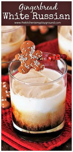 two glasses filled with ice cream and topped with gingerbread cookies on a red napkin