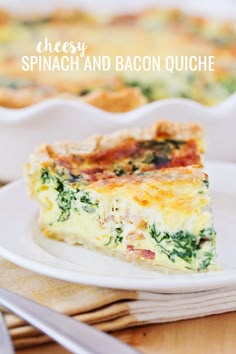 a slice of spinach and bacon quiche on a white plate with silverware