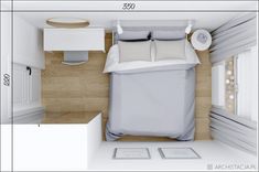 an overhead view of a bed with pillows and sheets