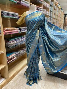 You can feel as regal as royalty with this stunning Kanjeevaram Silk Saree NK - 018! This unique beauty boasts a colorful design and an exquisite pattern that will make you stand out in any crowd. With a sublime sheen and luxurious feel, this saree will have you wishing you could wear it everyday! So don't wait - indulge yourself and add a touch of elegance to your wardrobe! Ready to Ship! Luxury Blue Katan Silk Saree, Kanjeevaram Silk Saree, Unique Beauty, Colorful Design, Silk Saree, Silk Sarees, Color Design, Royalty, Saree