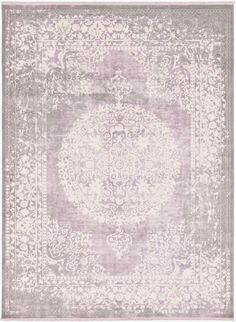 a rug with an ornate design on the top and bottom, in light purple tones