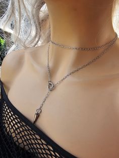 This is a dainty minimalist steel Lariat Necklace Set wrap gothic grunge punk aesthetic choker with Spike pendant.  The minimalist design gives it a trendy and stylish feel, while the steel gives it a touch of gothic Punk edge. It is waterproof sweatproof non-tarnish and hypoallergenic.  This necklace is versatile and can be worn long or doubled up for a layered look. This is a dainty chain, but is strong steel. is you are looking for someone more suitable to "fun and games" please take a look i Grunge Punk Aesthetic, Aesthetic Choker, Punk Aesthetic, Dainty Choker, Gothic Grunge, Wrap Necklace, Wrap Necklaces, Punk Grunge, Gothic Punk