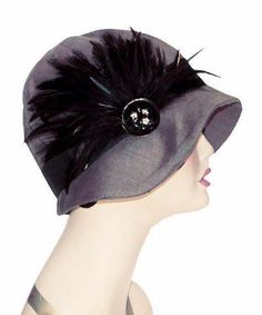 THE GRACE, handmade in Seattle, WA, USA, is a soft and flexible, 1920s style cloche hat. This hat is shown in Gray Linen with a 1 1/2 " grosgrain band and assorted trims. The brim is 2 " at center front, flaring out to 2 3/4 " at side front, and curving back to 3/4 " at center back of hat. The crown is made of six panels. Prices are as shown. May be ordered without band for $75. These hats are custom made and all sales are final. Available in Medium 22-1/2 " and Large 23-1/2 " with custom sizing Adjustable Cloche Hat In Flapper Style, Adjustable Cloche Flapper Hat, Flapper Style Short Brim Cloche Hat For Kentucky Derby, Winter Flapper Style Cloche Hat, Gatsby Style Adjustable Cloche Hat With Curved Brim, Adjustable Gatsby Cloche Hat With Curved Brim, Gatsby Style Cloche Hat For Kentucky Derby, Flapper Style Evening Hat With Short Brim, Flapper Style Brimmed Cloche Hat For Parties