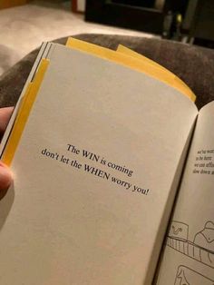 someone is holding an open book with the words, the win is coming don't let the when worry you