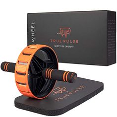 an orange and black spinning machine next to a box for truepulse on a white background