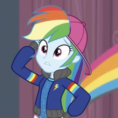 the rainbow pony is standing in front of a curtain with her hand on her head