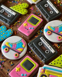 decorated cookies are arranged in the shape of old school music cassettes and audio tape recorders