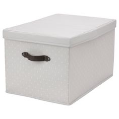 a white storage box with black handles