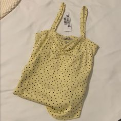 - Yellow With Black Polka Dots - Bunching Design On The Top - Brand New!!! Never Worn With Tags! Cheap Urban Outfitters Summer Tank Top, Urban Outfitters Tank Top, Urban Outfitters Top, Lace Trim Tank Top, Black Cropped Tank, Black Crop Top Tank, Babydoll Tank, Strappy Tank Tops, High Neck Tank Top