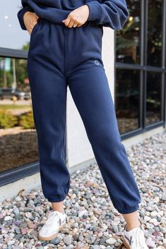 PRODUCT DESCRIPTION Get your cool, casual look on-point in the Smiley Sweatpants. Featuring a high elasticated waistband, elasticated ankles, side pockets, soft fleece fabric for extra comfort and embroidered smiley logo on front of the left leg. You can complete the tracksuit with the matching Smiley Hoodie for the perfect off-duty look. DETAILS & FIT Relaxed loose fit Elastic waist Elastic ankles Slant pockets Rise: 12.5" (based on a size small) Inseam: 30" (based on a size small) FABRIC & CARE 50% cotton 50% polyester Hand wash Sporty Full Length Pull-on Sweatpants, Sporty Cotton Sweatpants With Pull-on Style, Sporty Cotton Pull-on Sweatpants, Sporty Cotton Pull-on Style Sweatpants, Basic Bottoms With Ribbed Cuffs, Fall Activewear With Elastic Waistband And Tapered Leg, Casual Full-length Bottoms With Elastic Cuffs, Trendy Sweatpants With Elastic Cuffs For Jogging, Basic Jogging Pants With Elastic Waistband