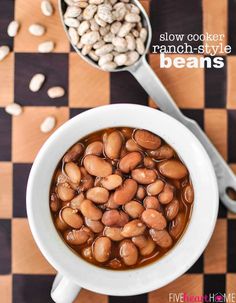 beans are in a white bowl on a checkered table