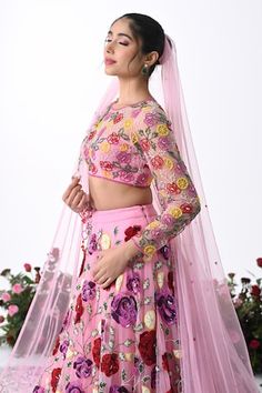 Rose pink attached cancan lehenga with all over gulaab garden embroidery using tonal 3D sequins, beads, cutdana highlights. Paired with a three fourth sleeves padded blouse with rosa cutdana embroidery, border embroidered net veil and a dupatta. - Aza Fashions Semi-stitched Pink Choli With Floral Embroidery, Pink Semi-stitched Choli With Floral Embroidery, Pink Sets For Navratri Reception, Pink Floral Embroidered Choli For Reception, Pink Sets For Reception And Navratri, Pink Reception Sets For Navratri, Pink Lehenga With Floral Embroidery In Traditional Drape, Pink Lehenga With Floral Embroidery, Pink Sharara With Floral Embroidery And Traditional Drape