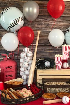 a baseball themed birthday party with balloons and snacks