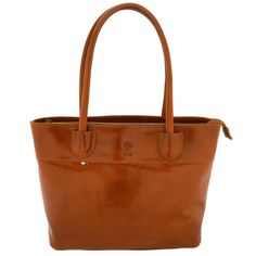 This genuine leather women's tote is hand-made in an old-fashioned artisan leather workshop in Florence, Italy by a family which has been crafting beautiful bags, wallets, and accessories from fine Italian leather for generations. Made from the highest quality full-grain calfskin Italian leather with attention to every detail, this elegant handbag is versatile, secure, and so roomy it easily fits all your necessities for a busy day yet doesn't look too big. This handbag is feminine and sophistic Laptop Bag For Women, Leather Workshop, Carryall Tote, Leather Artisan, Crocodile Pattern, Satchel Handbag, Tote Handbag, Florence Italy, Satchel Handbags