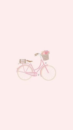 a pink bicycle with flowers in the basket