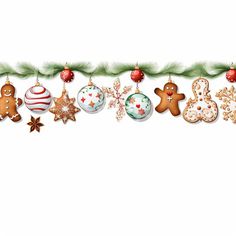 christmas cookies and decorations hanging from a line