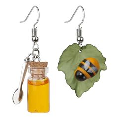 PRICES MAY VARY. One earring is a fabulous little glass jar is filled with golden honey and has a metal spoon. It is accompanied by a sweet little bee resting on a leaf for the other earring! you will get 1 pair of earrings as show DESIGN IDEA:Honeycomb is symbol of wisdom. Bee is a symbol of diligent.Suitable for any age.Divinos, perfectos, PERFECT GIFT to your wife/mom/girlfriend/daughter/grandmother/best friend/ even yourself on St. Valentine's Day, Easter Christmas day,Birthday,Anniversary , Jar Earrings, Bumble Bee Earrings, Show Design, Bee Costume, Golden Honey, Asymmetrical Earrings, Costume Women, Bee Earrings, Honey Jar