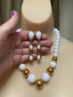 "You must have at least one set of white jewelry just for summer. White pearls don't count. I'm talking fun stuff. Necklace is signed Napier and earrings signed Trifari. Necklace will extend from 16 to 18\" with a hook clasp. Largest front beads are about 18 and 20mm round. They continue to be fairly big at about 10mm near clasp. Earrings are clip backs marked Trifari. Big look at 3\" but the largest section is against the earlobe. Not heavy anyway but I think the largest bead at top is a good i White Teardrop Jewelry Sets For Party, Modern White Teardrop Necklace, White Pearl Drop Costume Jewelry, White Costume Jewelry For Formal Occasions, White Teardrop Jewelry For Formal Occasions, White Teardrop Jewelry Sets With Matching Earrings, White Dangle Jewelry Sets For Formal Occasions, White Teardrop Jewelry For Party, Modern White Jewelry With Round Beads