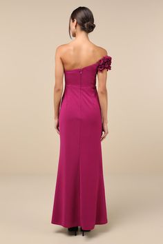 The Lulus Beyond Elegant Magenta 3D Floral One-Shoulder Maxi Dress was made for any occasion where you want a little extra attention! This gorgeous dress has a stretchy crepe knit composition that shapes a lightly gathered bodice (with hidden no-slip strips) and a one-shoulder-style neckline that flows into an off-the-shoulder sleeve adorned with eye-catching, three-dimensional floral appliques. The high, fitted waist sits atop a subtle A-line skirt with pleated details along the side and a swee Magenta Dress Outfit Wedding, Magenta Bridesmaid, Magenta Bridesmaid Dresses, Prom Dress Shops, Dress Shops, Magenta Dress, Gathered Bodice, Prom Dress Shopping, Maxi Dress Evening