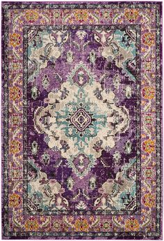 a purple and blue rug with an ornate design on the center, surrounded by multicolored flowers