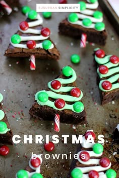 christmas brownies with green and red candies on top are arranged in the shape of trees