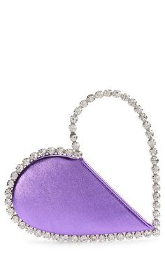 L'Alingi makes it easy to fall head-over-heels for this playfully chic bag with a wraparound crystal top handle in the shape of a heart. Top zip closure Top carry handle Interior wall pocket Lined Leather or textile Imported Designer Handbags Luxury Heart-shaped Formal Bags, Designer Heart-shaped Evening Bag, Elegant Silver Heart-shaped Bag, Luxury Leather Heart-shaped Bag, Glamorous Heart-shaped Evening Bag, Red Heart-shaped Evening Bag, Rhinestone Handbags, Crystal Top, Purple Purse