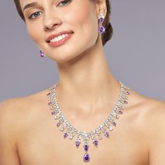 Indulge yourself in this shimmering bonanza. This collection oozes style and sophistication and is sure to make you stand out in a crowd. The mount is expertly set with shimmering, deep regal purple and ice white Diamondeau®, flawless simulated diamond. The collection is given a truly decadent feel with a glimmering golden finish. Complete the look with the matching earrings making you statement ready for the festive season. Elegant Lavender Jewelry For Evening, Elegant Lavender Evening Jewelry, Luxury Purple Jewelry For Party, Elegant Purple Jewelry With Diamond Accents, Glamorous Purple Jewelry For Evening, Purple Luxury Jewelry For Party, Dazzling Purple Wedding Jewelry, Elegant Purple Jewelry For Evening, Elegant Purple Jewelry For Formal Occasions