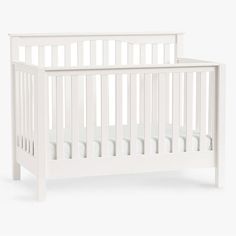 a white crib is shown against a white background