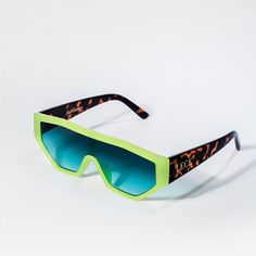 LIME NEON GLASSES WITH CHEETAH PRINT SIDES Green Plastic Sunglasses For Outdoor Use, Green Plastic Sunglasses For Outdoor, Outdoor Green Plastic Sunglasses, Trendy Green Outdoor Sunglasses, Trendy Green Sunglasses For Outdoor, Green Shield Sunglasses With Uva Protection For Outdoor, Casual Green Shield Sunglasses For Summer, Green Plastic Sunglasses With Uv Protection, Modern Green Shield Sunglasses With Uva Protection