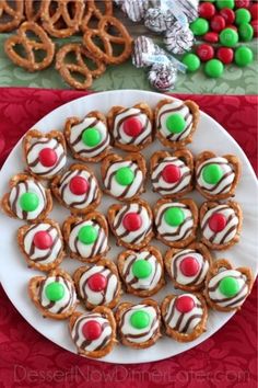 christmas cookies and pretzels on a white plate