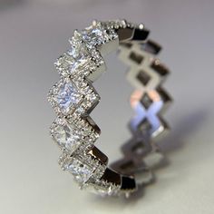 a diamond ring is shown on a table