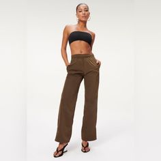 New With Tags Good American Wide Leg Mocha Brown Colored Track High Rise Pants. These Pants Are A Size 1 Which Is Equal To A Size Small Inseam: 31 Inches Waist: 27 Inches Rise: 11 Inches Brown Cargo Pants With Elastic Waistband For Spring, Spring Brown Cargo Pants With Elastic Waistband, Brown Trousers With Elastic Waistband, Brown Straight Cargo Pants For Summer, Brown Straight Pants With Elastic Waistband, Brown Wide Leg Cargo Pants For Summer, Brown Wide Leg Cargo Pants With Elastic Waistband, Brown Cargo Pants With Elastic Waistband For Work, Brown High-waisted Cargo Pants With Elastic Waistband