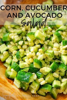 corn, cucumber and avocado salad on a cutting board with text overlay