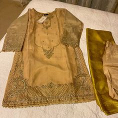 3 Piece Beautiful Designer Fancy Party Eid Wear Pakistani Salwar Kameez Vibrant Colors Embroidered Shirt Gold Tan Beige Gift Present Gota Work Dress May Appear Darker Or Lighter Shade Of Gold Based On The Lighting Wedding / Party Bridesmaid / Punjabi Casual / Dance / Pooja Diwali / Muslim Afghani Bengali Indian Pakistani Arab Eid Sana Safinaz, Gul Ahmad, Khaadi, Asim Jofa, Farah Talib Aziz, Maria B, Faraz Manan, Sobia Nazir, Threads And Needels, Threads And Motifs, Chineyere, Bonanza, Ethnic, Sa Elegant Shantoon Sets With Zari Work, Elegant Festive Anarkali Set In Shantoon, Elegant Shantoon Sharara For Festive Occasions, Silk Sharara For Summer Party, Party Sets With Intricate Embroidery On Shantoon, Party Kurta With Intricate Embroidery In Shantoon, Elegant Party Sharara In Shantoon, Elegant Shantoon Traditional Wear For Festive Occasions, Gold Chinon Traditional Wear For Party