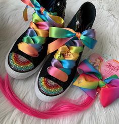 "JoJo Siwa DREAM Tour inspired rainbow shoes, JoJo Siwa Party Shoes, JoJo Siwa Birthday Costume, Birthday Inspired outfit and JoJo Siwa Bow Set Rainbow Bright* Available and ready to ship. A satin black body canvas Converse high top with rainbow metallic accents, Jojo Siwa's DREAM TOUR inspired custom bling high top Converse shoe for those craving some cool JoJo Siwa dance moves in your next JoJo Siwa DREAM TOUR Concert, Birthday Party, Back to School, Dress up, Halloween Costume Trully fun colo Jojo Siwa Party, Bedazzled Shoes Diy, Canvas Converse, Birthday Costume, Jojo Siwa Bows, Jojo Siwa Birthday, Bright Shoes, Bling Converse, Girls Shoes Sneakers