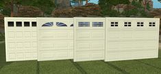 three white garage doors in front of some trees