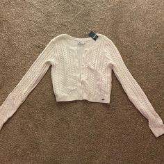 Desc: Knit Button Up Cardigan Brand: Hollister Condition: Never Worn Has Tags Size: Womens Medium