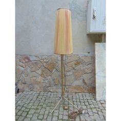 a lamp that is sitting on the ground