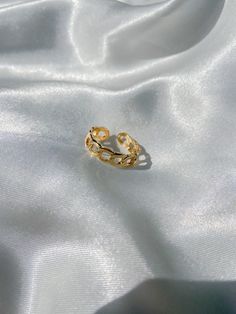 This adorable gold ring is a US size 6 but can adjust up to a size 8! Made with 18k gold! Do you have any questions or concerns please message me and I'll try and get back to you ASAP! Happy shopping! Trendy Gold Toe Ring, Gold-plated Rings With Adjustable Chain, Gold Plated Open Chain Promise Ring, Adjustable Open Ring For Promise, Adjustable Open Promise Ring With Chain, Adjustable Open Chain Ring, Adjustable Gold Chain Ring For Anniversary, Gold Rings With Adjustable Chain As Gift, Gold Chain Open Ring As Gift