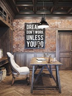 a room with a brick wall, wooden floors and a large sign that says dream don't work unless you do