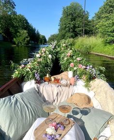 a boat filled with lots of food and flowers