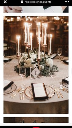 an elegant table setting with candles and flowers