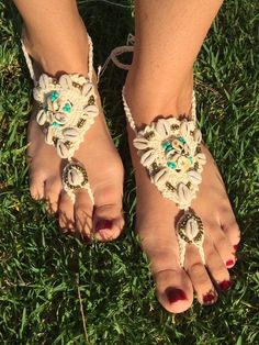 These adorable barefoot sandals can be worn barefoot or with shoes. They are very comfortable and light to wear it. Hand crocheted and decorated with sea shells and glass beads. Perfect for a festival, bohemian wedding or for the sunny day on the beach :) one size, Made from cotton. Care: hand wash - lay flat to dry. The price is for a pair of sandals.