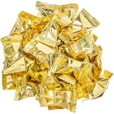 a pile of gold foiled chocolate pieces