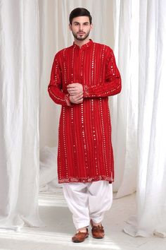 Red kurta with threadwork vine patterns, embellished by mirrorwork and sequins. Comes with patiyala. - Aza Fashions Bollywood Style Kurta With Traditional Drape And Mirror Work, Unstitched Kurta With Mirror Work For Festive, Festive Semi-stitched Sherwani With Gota Work, Traditional Red Ceremonial Sherwani, Festive Kurta With Mirror Work And Traditional Drape, Traditional Drape Kurta With Mirror Work For Eid, Traditional Sherwani With Gota Work And Straight Kurta, Chanderi Sherwani With Mirror Work In Traditional Drape, Navratri Semi-stitched Sherwani With Gota Work