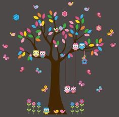 an owl tree with owls and flowers on it's branches, hanging from a swing