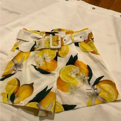 Nwot Unbranded Boutique High Waist, Pleated, Belted Lemons & Floral Design Shorts Sz. S, Super Cute Can Be Worn For Dress Or Casual. See Pics,Great Gift. 13” Waist 18” Hips 14” Length Measurements Are Approximate And Are Taken Laying Flat Spring Lemon Print Bottoms, Fitted Bottoms With Lemon Print For Spring, Casual Bottoms With Lemon Print For Spring, Casual Lemon Print Bottoms For Spring, High Waist Yellow Shorts For Spring, Yellow Lemon Print Bottoms For Summer, Yellow Shorts With Pockets For Day Out, Yellow Lemon Print Summer Bottoms, Yellow Shorts With Pockets For Spring