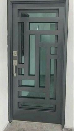 a modern door with glass panels on the outside